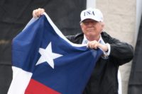 Emerging from a briefing on disaster relief in Corpus Christi, President Donald Trump climbed up a ladder for an impromptu address to a mix of supporters and banner-waving protesters gathered outside