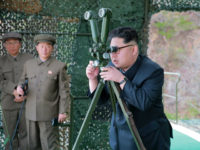 DEMOCRATIC PEOPLE'S REPUBLIC OF KOREA : This picture released from North Korea's official Korean Central News Agency (KCNA) on April 24, 2016 shows North Korean leader Kim Jong-Un (R) inspecting an underwater test-fire of a strategic submarine ballistic missile at an undisclosed location in North Korea on April 23, 2016. North Korean leader Kim Jong-Un hailed a submarine-launched ballistic missile (SLBM) test as an 