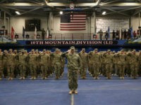 U.S. Army soldiers salute during a welcome-home ceremony after from Iraq on May 17, 2016 at Fort Drum, New York. More than 1,000 members of the 10th Mountain Division 1st Brigade Combat Team are returning home after a 9-month deployment in Iraq as part of Operation Inherent Resolve to train and advise Iraqi forces fighting the Islamic State. The 10th Mountain brigade was replaced in Iraq by the 101st Airborne 2nd Brigade Combat Team based at Ft. Campbell, Kentucky. (Photo by John Moore/Getty Images)