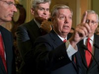 Sen. Lindsey Graham, R-S.C., joined by, from left, Sen. John Barrasso, R-Wyo., Sen. Bill Cassidy, R-La., and Senate Majority Leader Mitch McConnell, R-Ky., speaks to reporters as they faced assured defeat on the Graham-Cassidy bill, the GOP's latest attempt to repeal the Obama health care law, at the Capitol in Washington, Tuesday, Sept. 26, 2017. The decision marked the latest defeat on the issue for President Donald Trump and Senate Majority Leader Mitch McConnell in the Republican-controlled Congress. (AP Photo/J. Scott Applewhite)