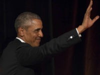 SYDNEY, AUSTRALIA - MARCH 23: Barack Obama waves goodbye to the audience as he attends a talk at the Art Gallery Of NSW on March 23, 2018 in Sydney, Australia. The former US president is on a private speaking tour of Australia and New Zealand and spoke to more than 200 Australian business leaders and young entrepreneurs at the Mastercard event in Sydney. Sharing his insights on the future of innovation, President Obama's message to the audience is expected to have a lasting impact and influence on those who attended. (Photo by James D. Morgan/Getty Images)