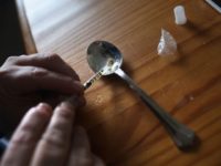 NEW LONDON, CT - MARCH 23: A heroin user prepares to inject himself on March 23, 2016 in New London, CT. Communities nationwide are struggling with the unprecidented heroin and opioid pain pill epidemic. On March 15, the U.S. Centers for Disease Control (CDC), announced guidelines for doctors to reduce the amount of opioid painkillers prescribed nationwide, in an effort to curb the epidemic. The CDC estimates that most new heroin addicts first became hooked on prescription pain medication before graduating to heroin, which is stronger and cheaper. (Photo by John Moore/Getty Images)