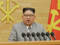 This picture from North Korea's official Korean Central News Agency (KCNA) taken and released on January 1, 2018 shows North Korean leader Kim Jong-Un delivering a New Year's speech at an undisclosed location. Kim Jong-Un vowed North Korea would mass-produce nuclear warheads and missiles in a defiant New Year message on January 1 suggesting he would continue to accelerate a rogue weapons programme that has stoked international tensions. / AFP PHOTO / KCNA VIA KNS / - / South Korea OUT / REPUBLIC OF KOREA OUT ---EDITORS NOTE--- RESTRICTED TO EDITORIAL USE - MANDATORY CREDIT 'AFP PHOTO/KCNA VIA KNS' - NO MARKETING NO ADVERTISING CAMPAIGNS - DISTRIBUTED AS A SERVICE TO CLIENTS THIS PICTURE WAS MADE AVAILABLE BY A THIRD PARTY. AFP CAN NOT INDEPENDENTLY VERIFY THE AUTHENTICITY, LOCATION, DATE AND CONTENT OF THIS IMAGE. THIS PHOTO IS DISTRIBUTED EXACTLY AS RECEIVED BY AFP. / (Photo credit should read -/AFP/Getty Images)